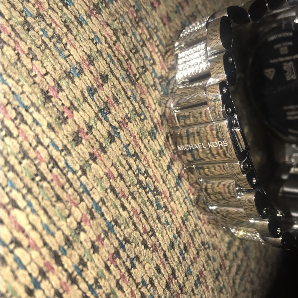 A brand new Micheal Kors smart watch.